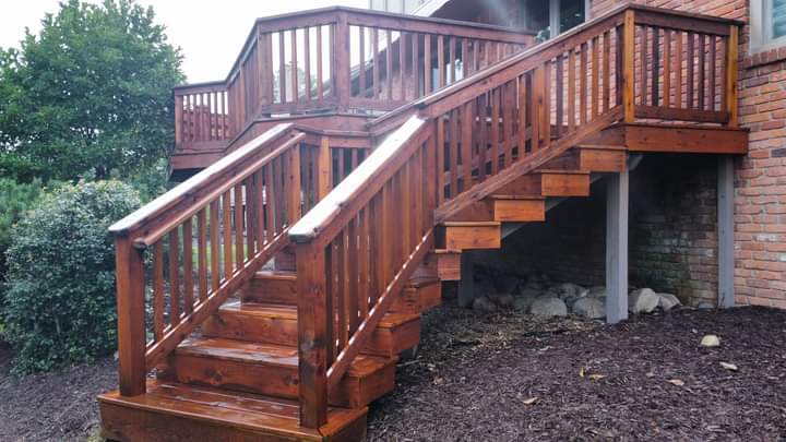 This is the after picture of a deck, staining and pressure washing in Orland Park Illinois performed by Chicago property detailing and pressure washing.